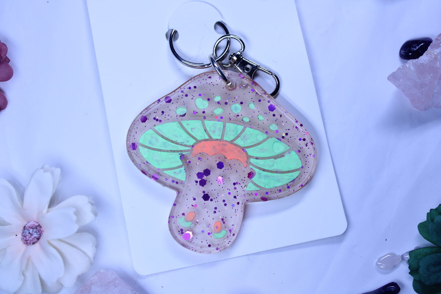 Purple, green, and orange mushroom keychain