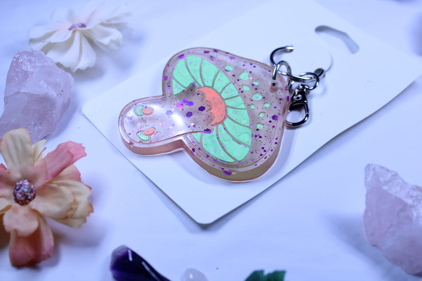 Purple, green, and orange mushroom keychain